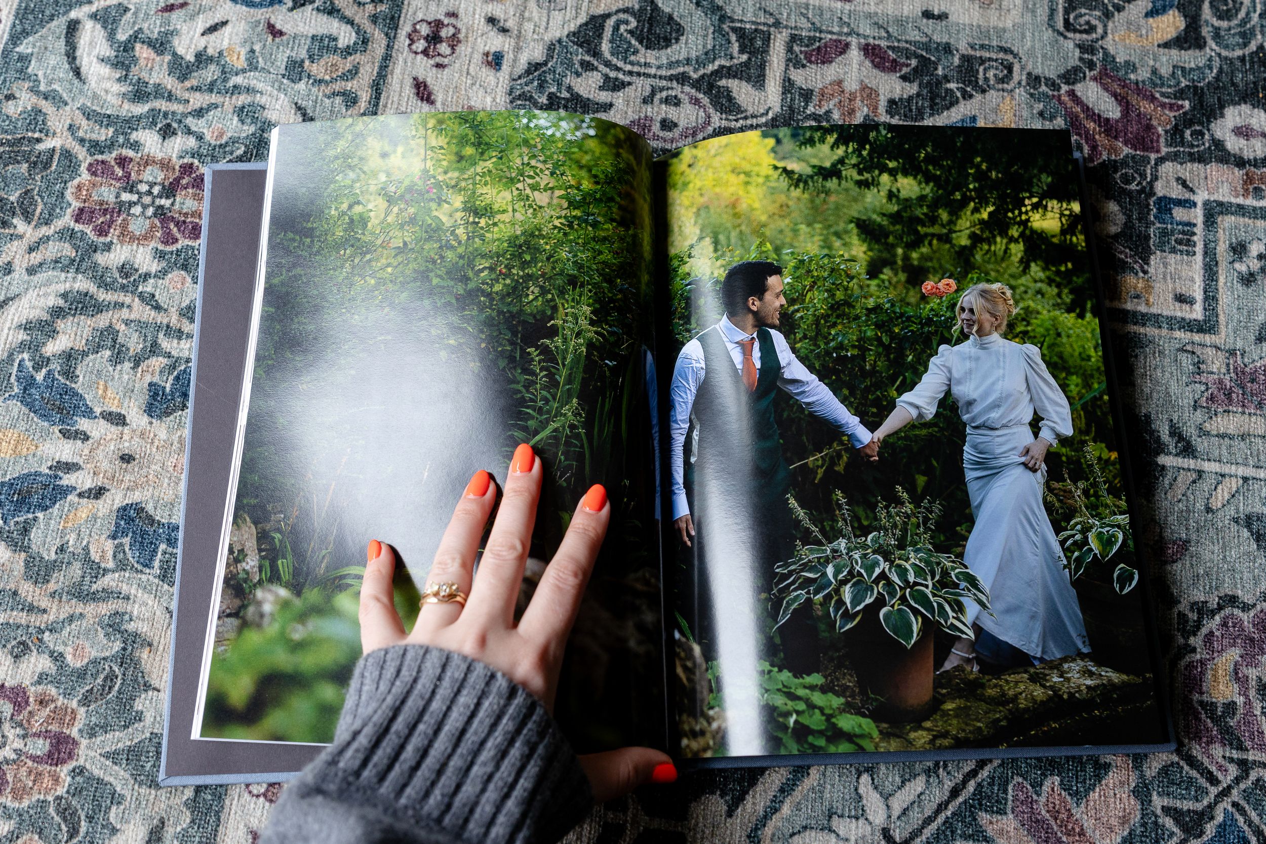 A series of connected photographs showing a couple's romantic engagement moment in a garden setting.