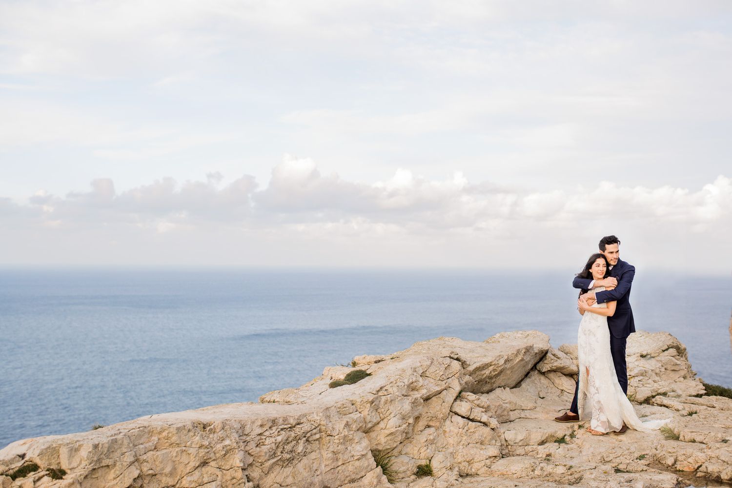 Mallorca destination wedding couple portrait on coastal cliffs overlooking the Mediterranean