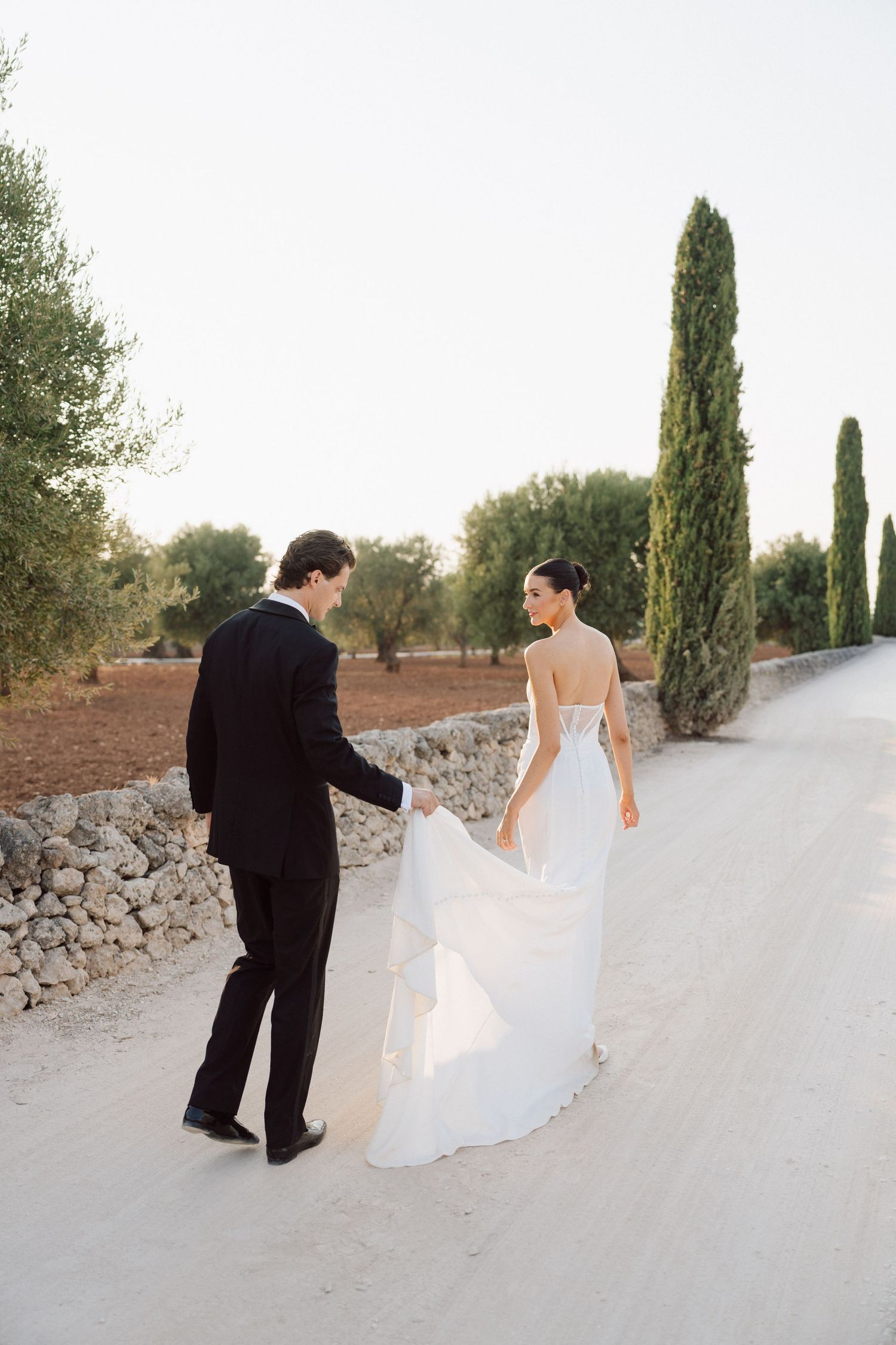 Elegant outdoor wedding reception with string lights creating a romantic ambiance.