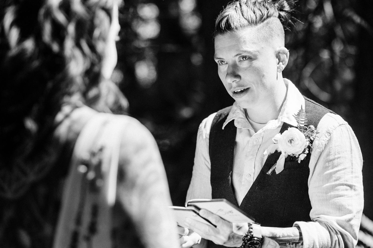 bride reading her vows and getting teary eyed