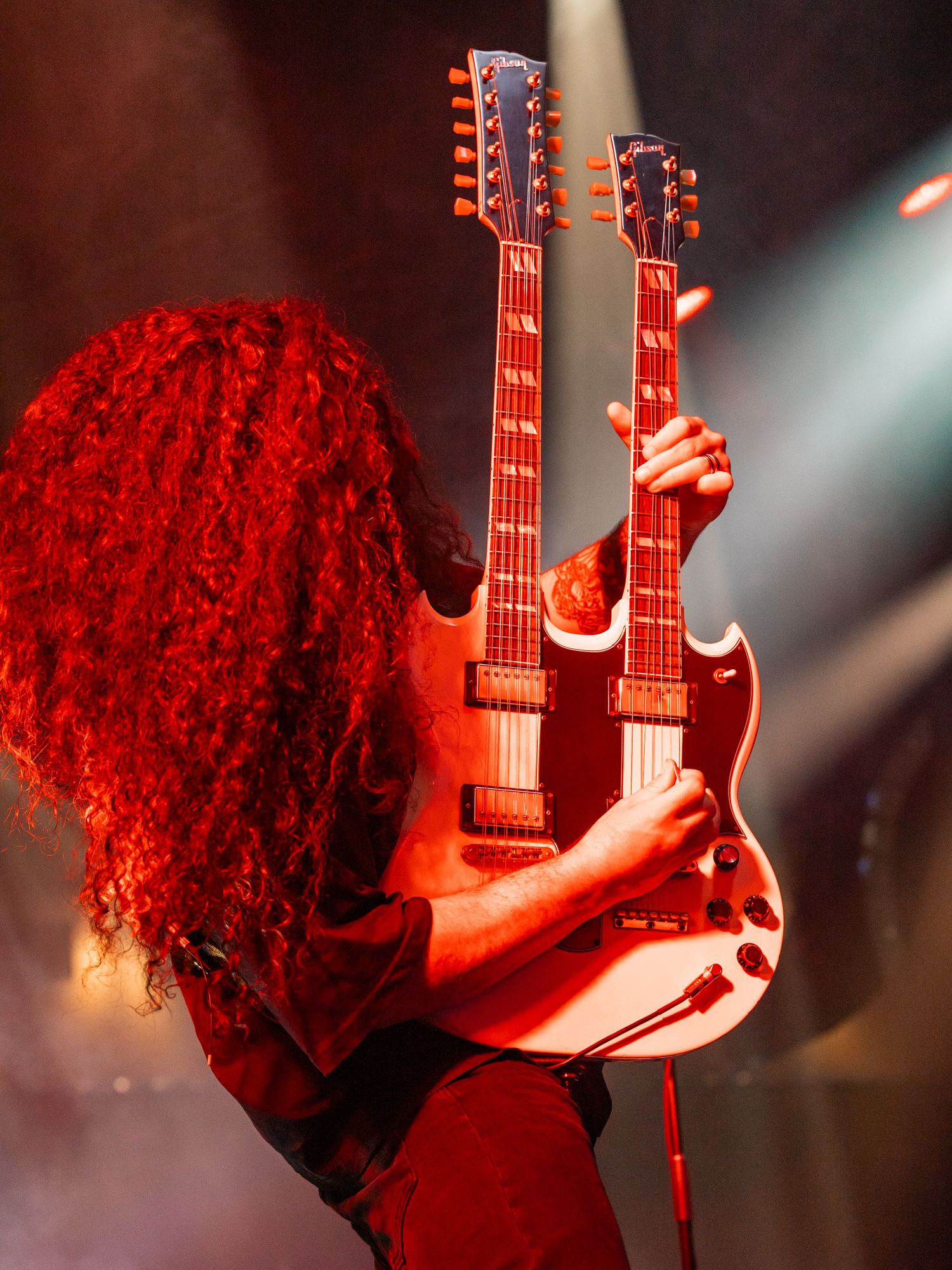 Photograph of Claudio Sanchez the singer and guitar player for Coheed and Cambria live on state