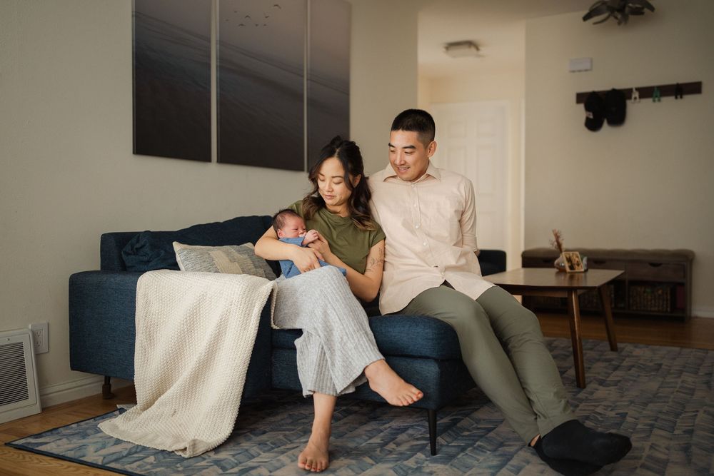 A series of candid lifestyle photos showing a family relaxing together on a carpeted floor.