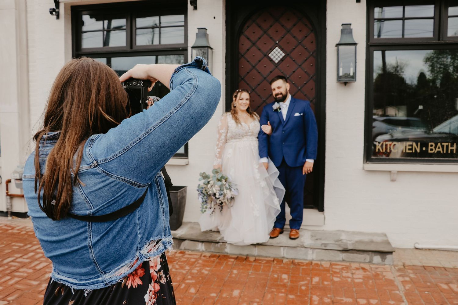 Photographer taking bride and grooms portrait in Metamora Michigan