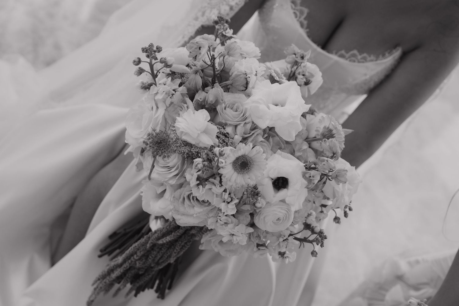Bride dress and bouquet detail photo at Majestic Elegance Costa Mujeres