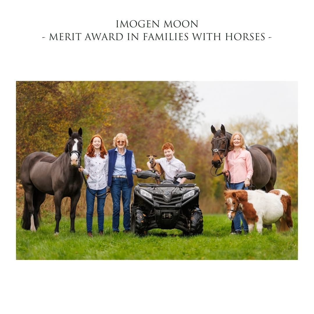 Family portrait session with horses and an ATV in a scenic autumn field setting.