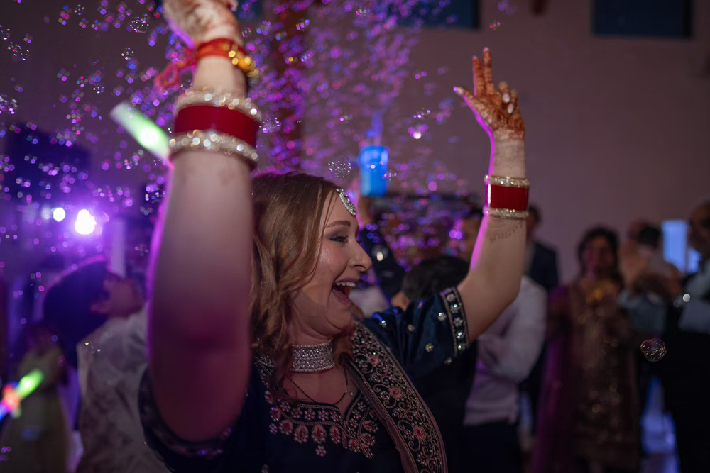 Columbus Ohio Wedding Venues guest dancing  with the bride