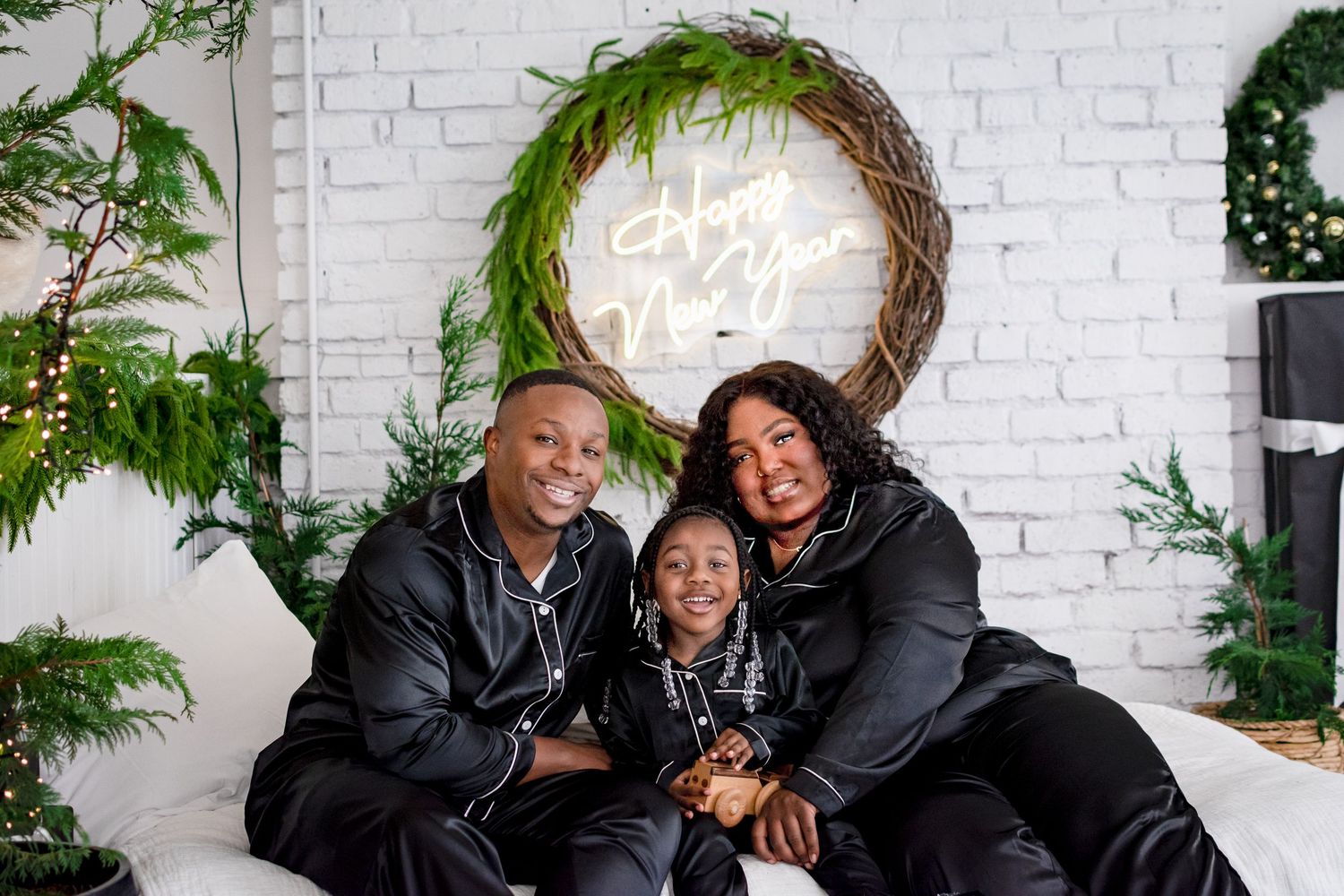 Family wearing matching pajamas during Tacoma Christmas session