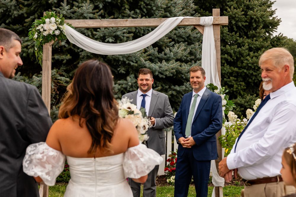 Backyard wedding garden ceremony in Omaha, Nebraska. - BrightSide Photography