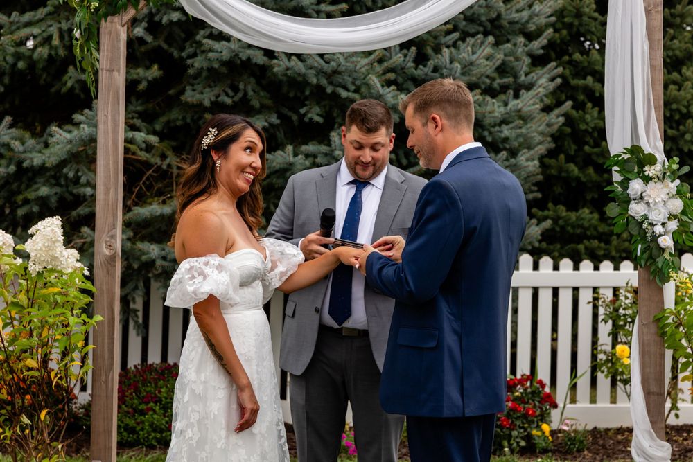 Bride & Groom at backyard wedding garden ceremony in Omaha, Nebraska. - BrightSide Photography