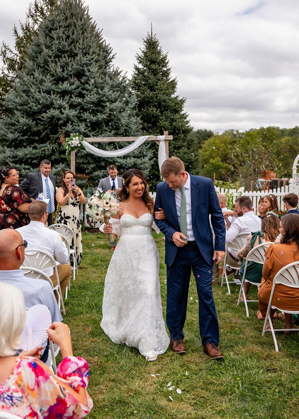 Just Married - Bride & Groom at backyard wedding garden ceremony in Omaha, Nebraska. - BrightSide Photography