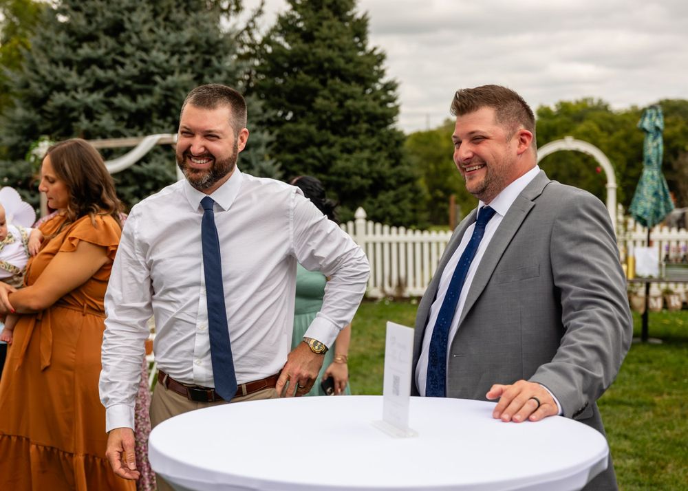 Wedding reception at backyard garden wedding in Omaha, Nebraska. - BrightSide Photography