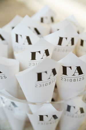 Close-up macro shots of white paper receipts or tickets with printed numbers arranged in a repeating pattern.