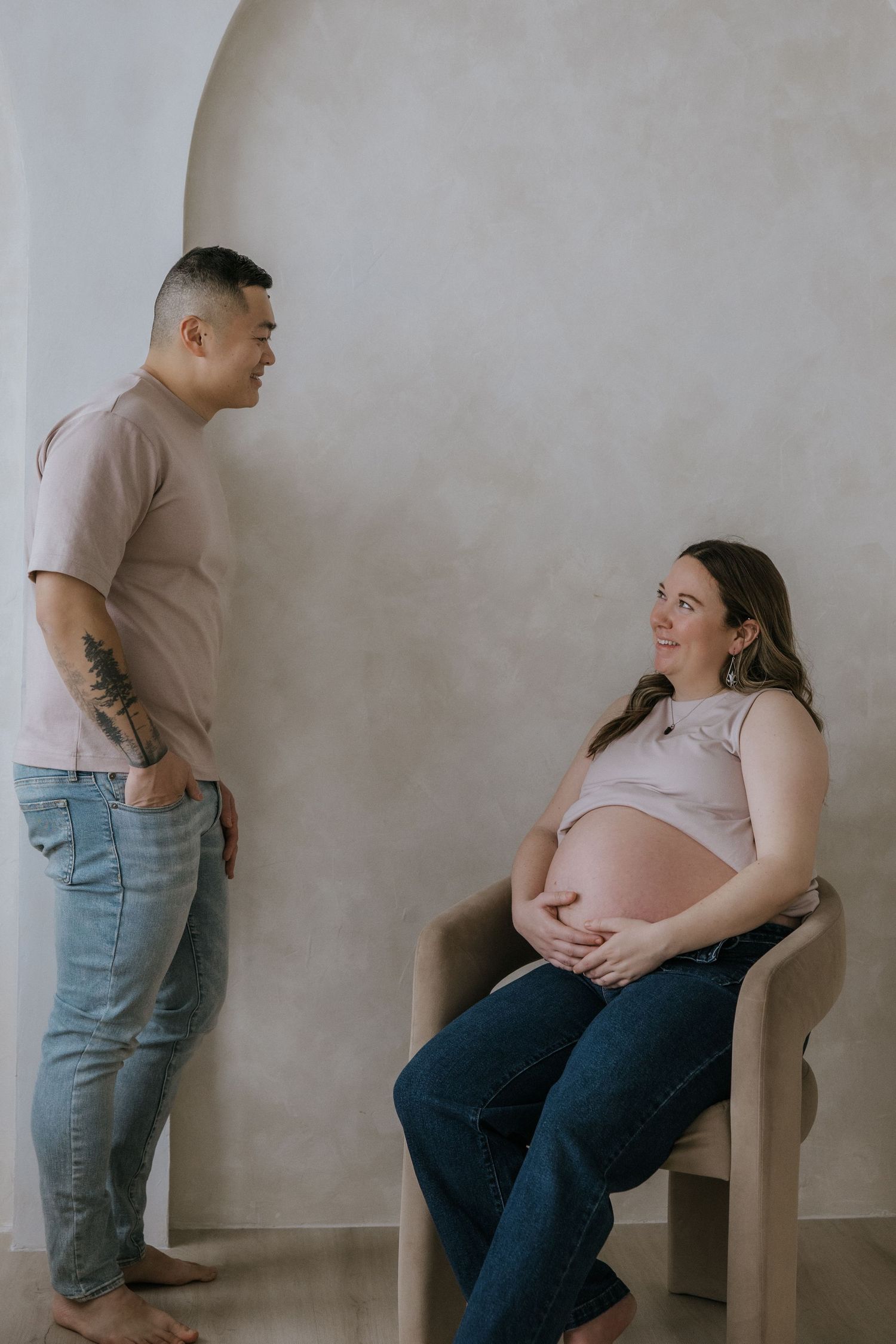 Maternity photo sequence showing couple interacting and sharing moments during pregnancy photoshoot.
