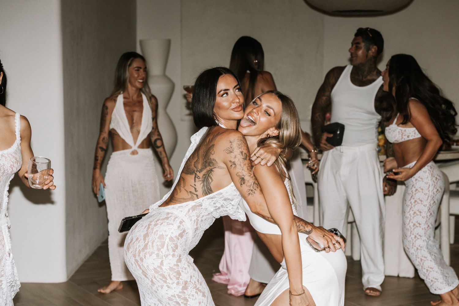 A collage of people in white outfits dancing and celebrating at a party or social gathering.