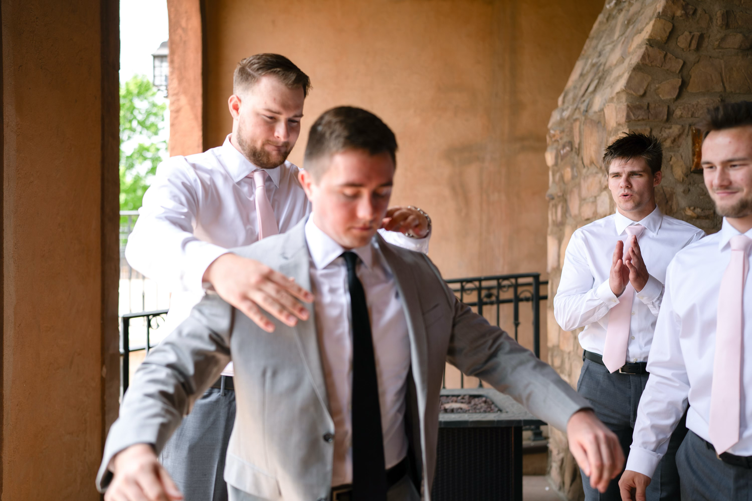 a groom getting ready wedding photo at the corazon