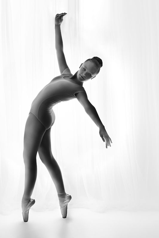 Black and white, creative backlit dance portrait photography on pointe in studio Baltimore Ontario*