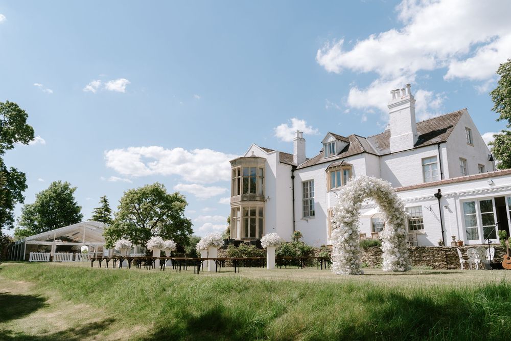 Panoramic view of Twyning Park under blue summer skies.
