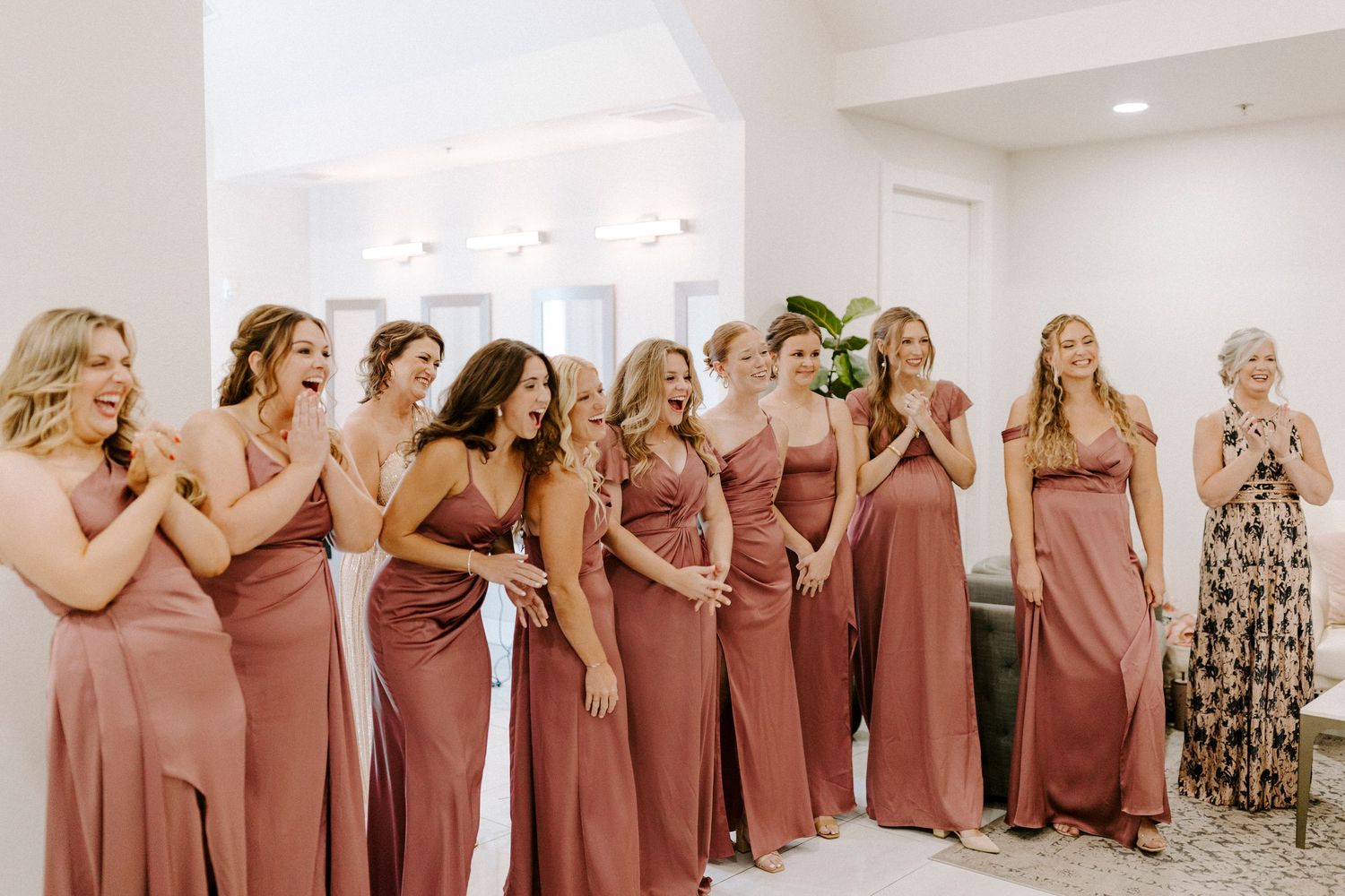 A panoramic collage of bridesmaids wearing dusty rose dresses showing various candid moments during a wedding celebration at Osage House.