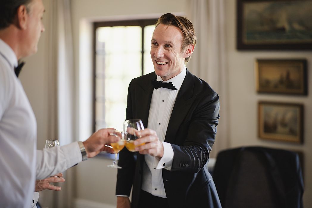 Grooming having a celebratory drink ahead of the wedding
