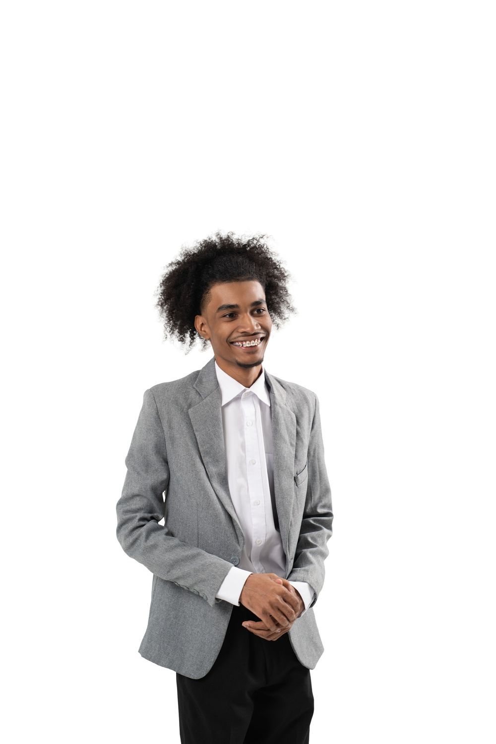 Professional wearing a gray blazer and white shirt smiling and posing in a series of dynamic business portraits.