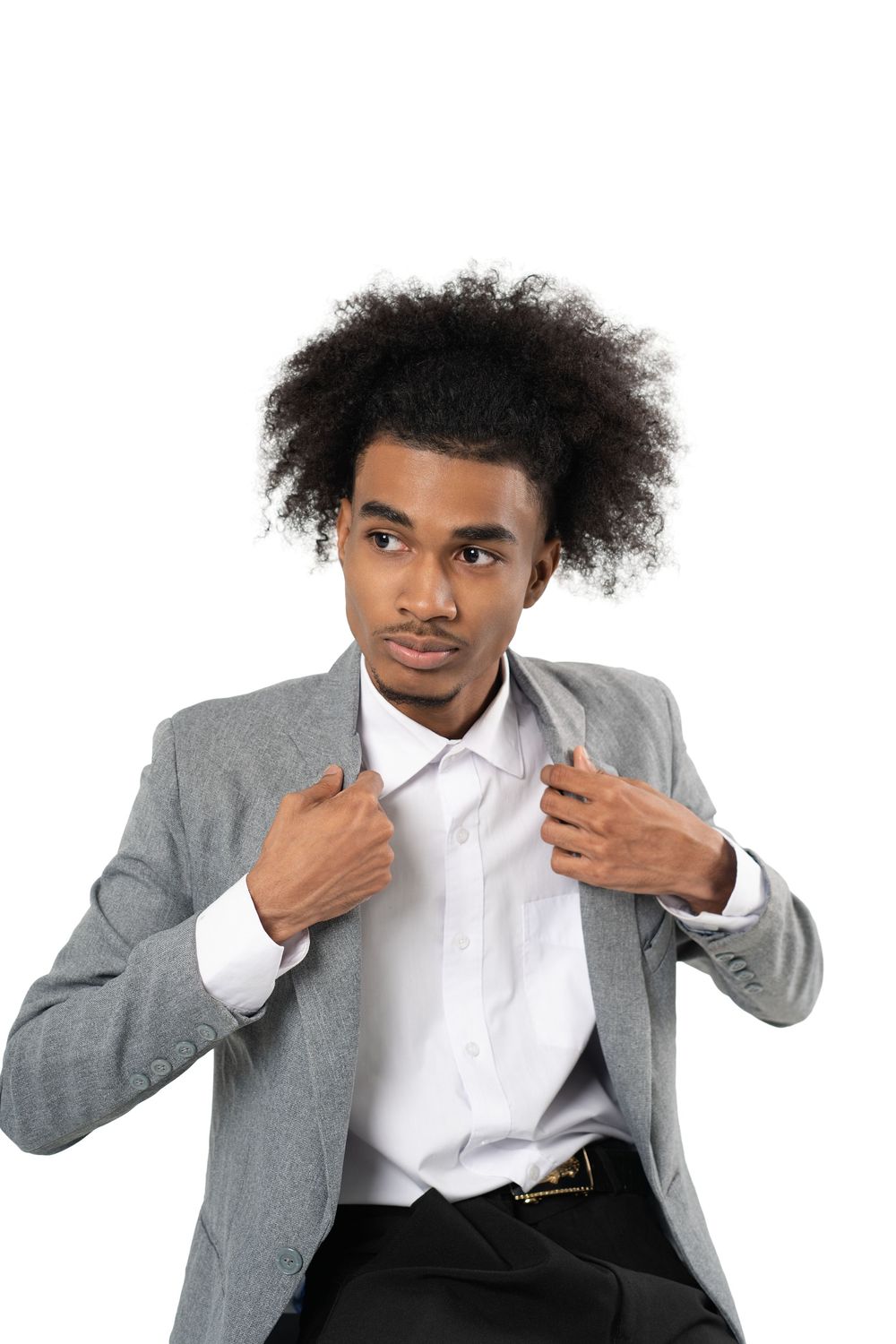 Young man in gray suit and white shirt poses playfully in four sequential shots against white background.