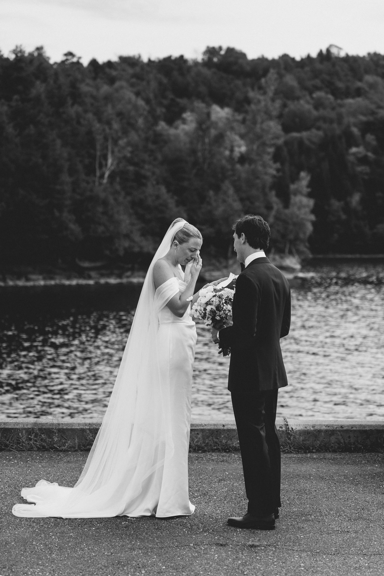 A series of wedding photos showing a couple in formal attire by a lake with trees in the background.