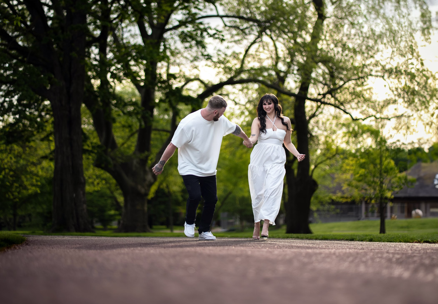 a spontaneous engaged couple pose for an engagement session