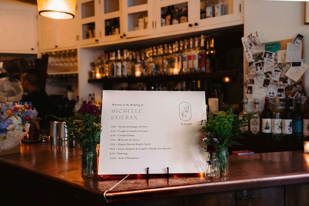 Elegant bar setup with ambient lighting and fully stocked shelves in a cozy indoor space.