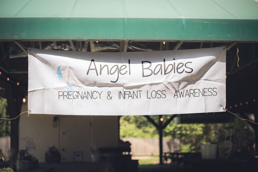 A banner for Angel Babies pregnancy and infant loss awareness event.