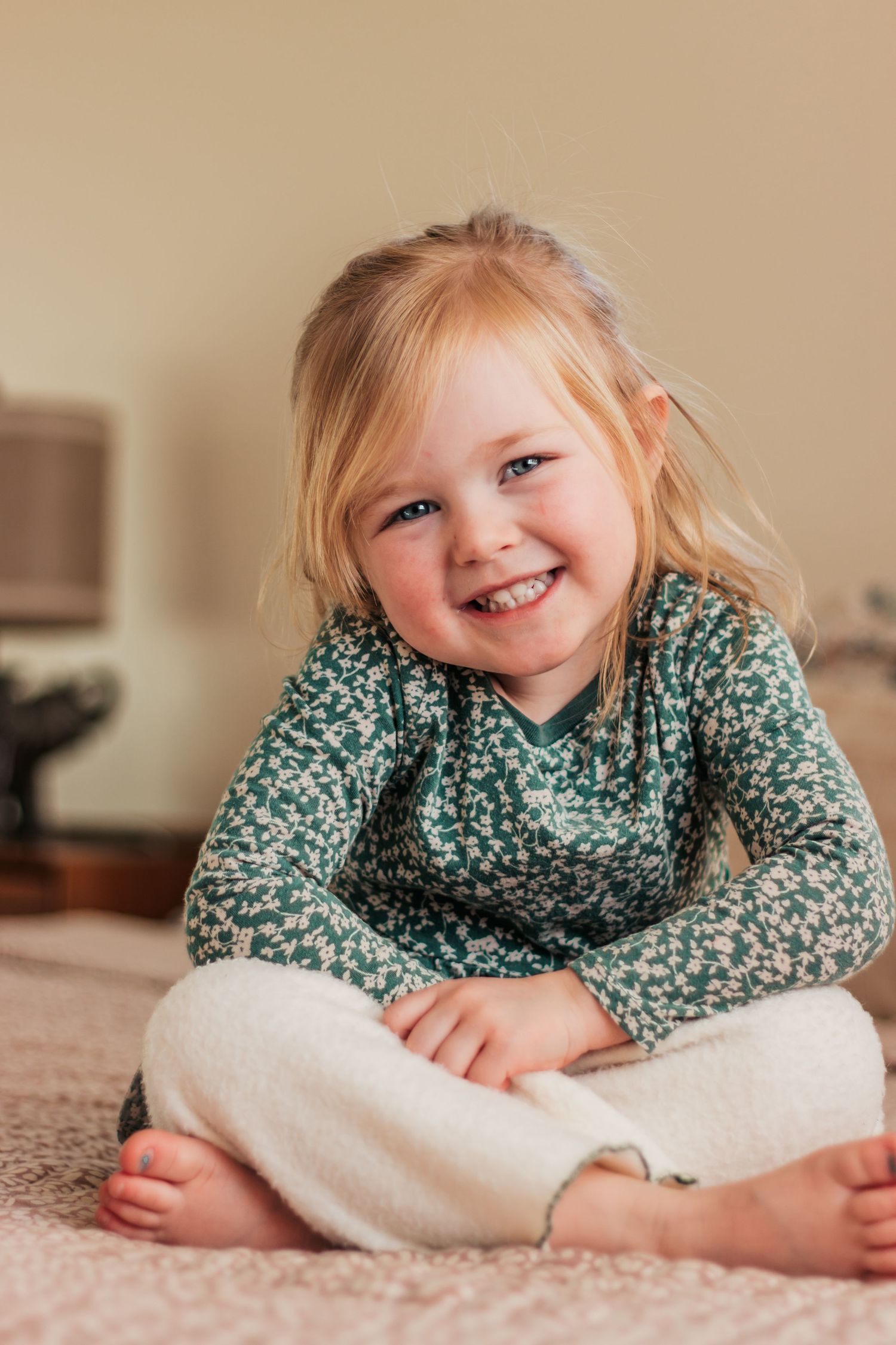 A close-up portrait of someone with a warm smile against a neutral background | Kids Birthday Photo Sessions