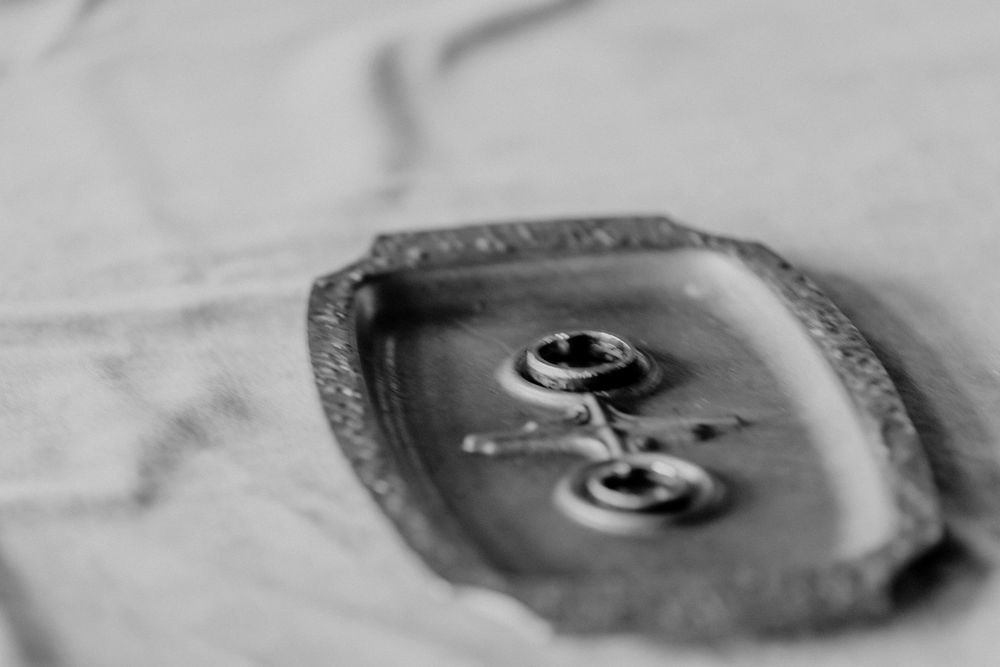 Abstract black and white macro photography of metallic surfaces.