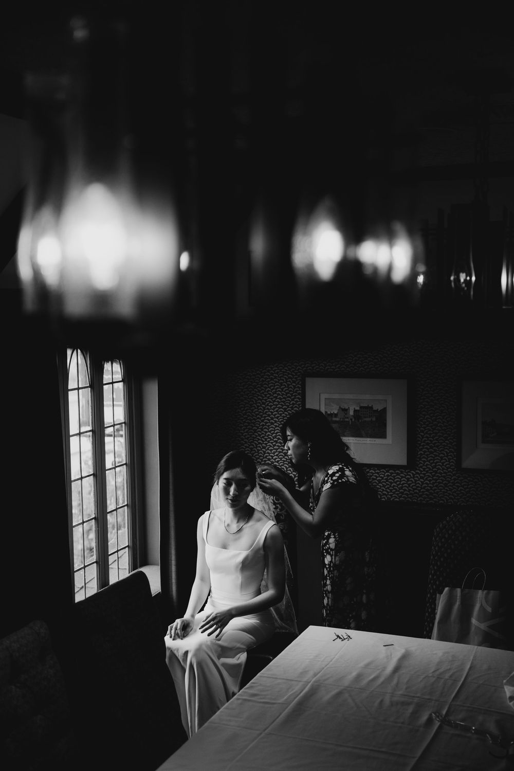 Romantic couple portrait with the bride’s veil blowing in the wind at Five Crowns in Corona del Mar, California.