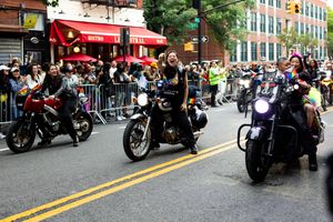 Dykes on bikes at New York pride parade photographed by queer documentary photographer Kade Joy.