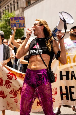 Silence equals death activist candid queer life photography at LGBTQ+ march by lesbian photographer Kade Joy.