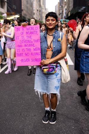 Lesbian event attendee at dyke march by queer New York City event photographer Kade Joy.