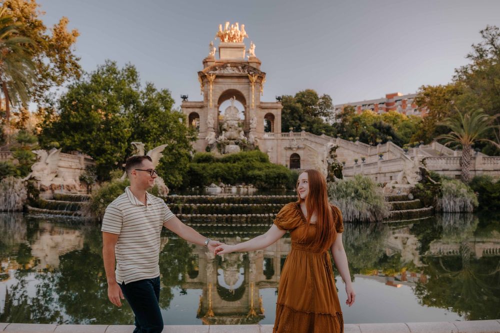 Couple walking away from camera holding hands through it all.