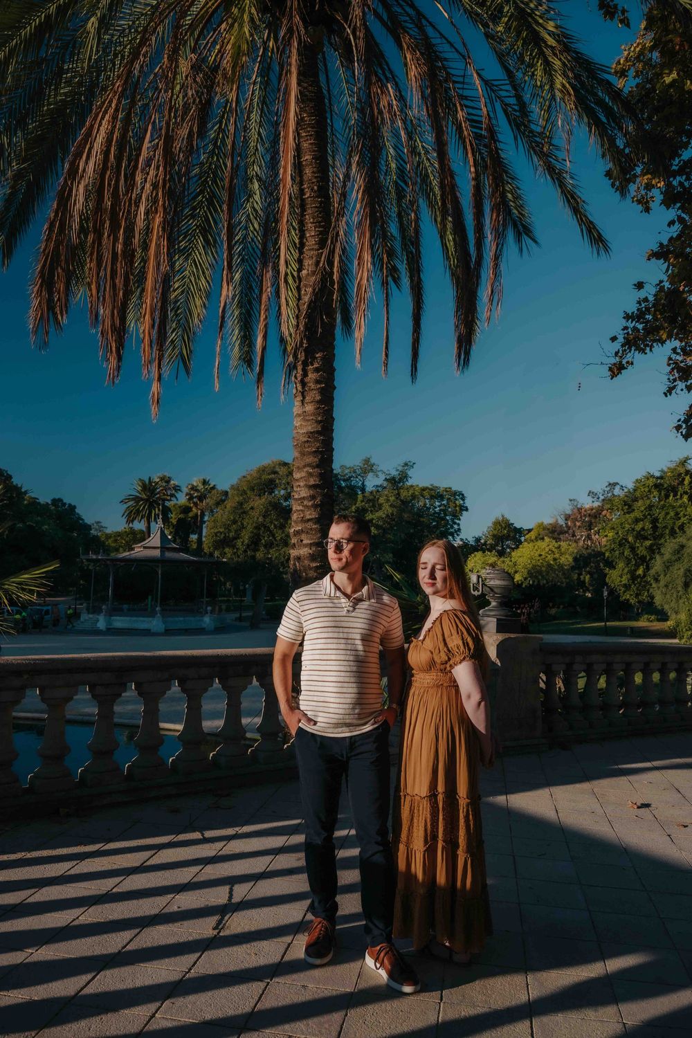 Wide shot of couple alone in the park with minimalistic composition.