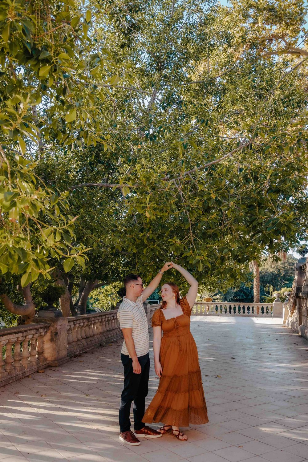 Soft autumn light hitting the couple's faces natural photography Barcelona.