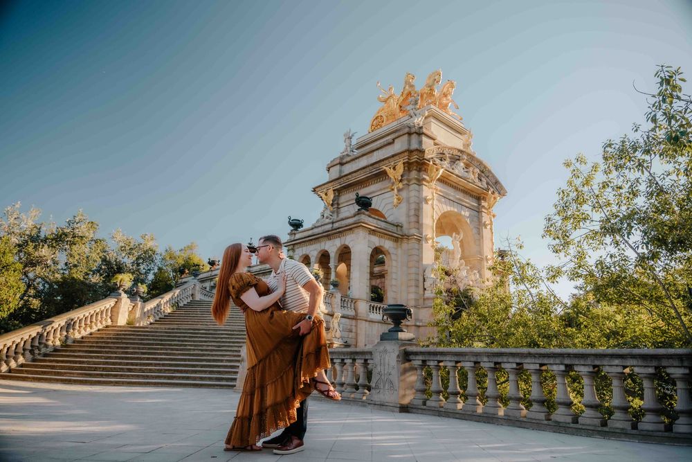 Candid Barcelona photographer capturing delicate glance between husband and wife.