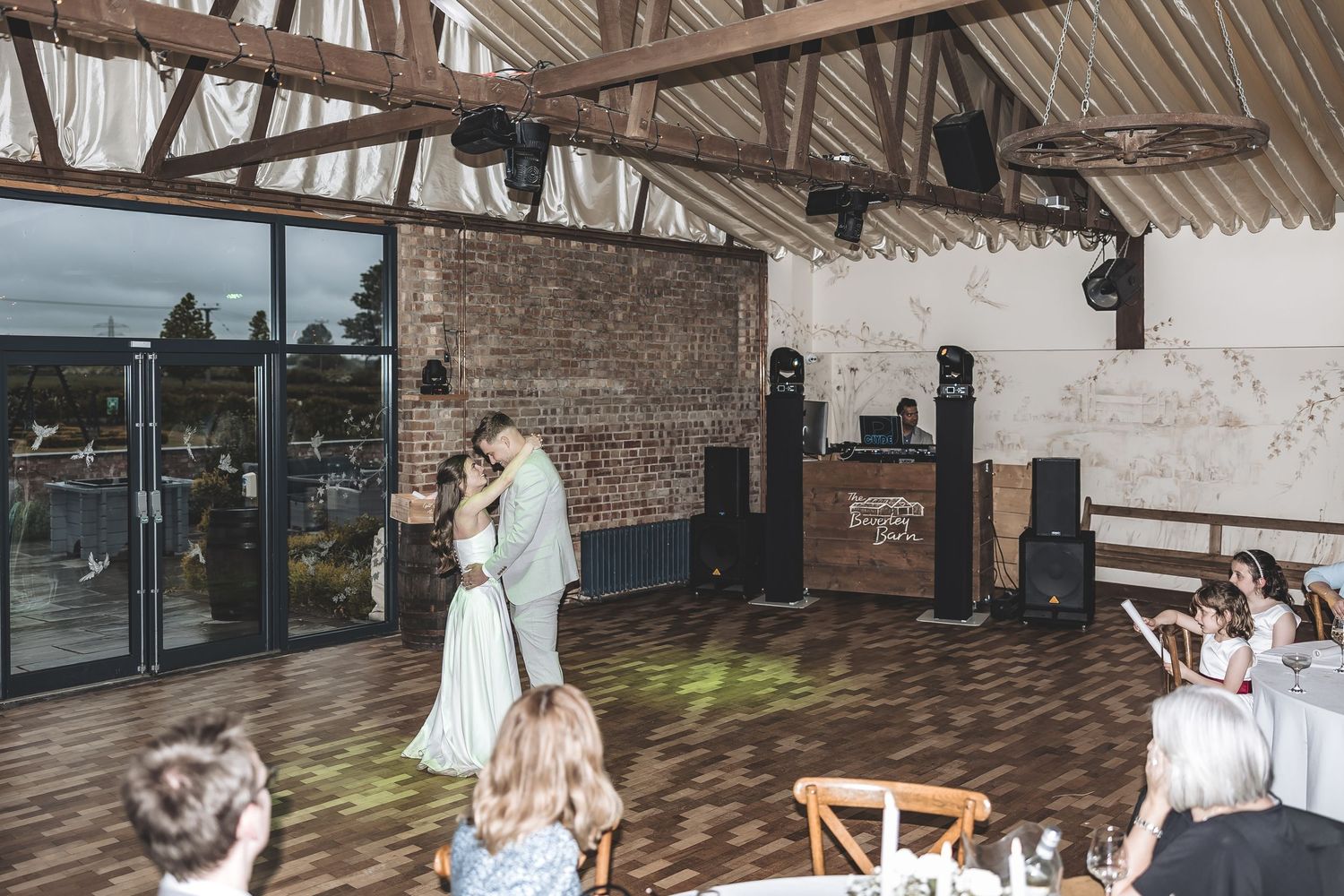 An intimate wedding first dance captured naturally at the Beverley Barn.