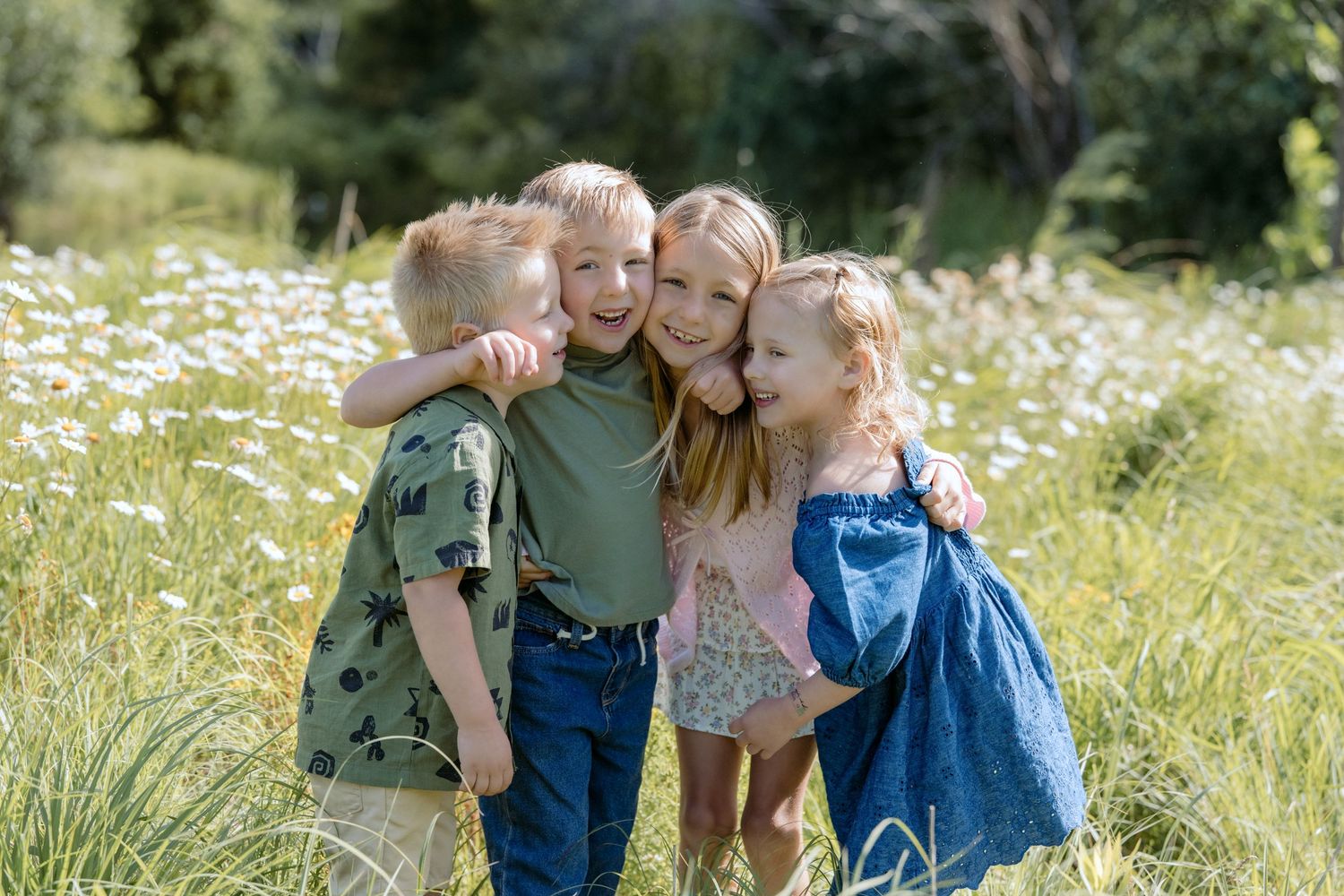 flower field portrait of all the cousins during an extended family photo session at powers lake park in woodbury mn