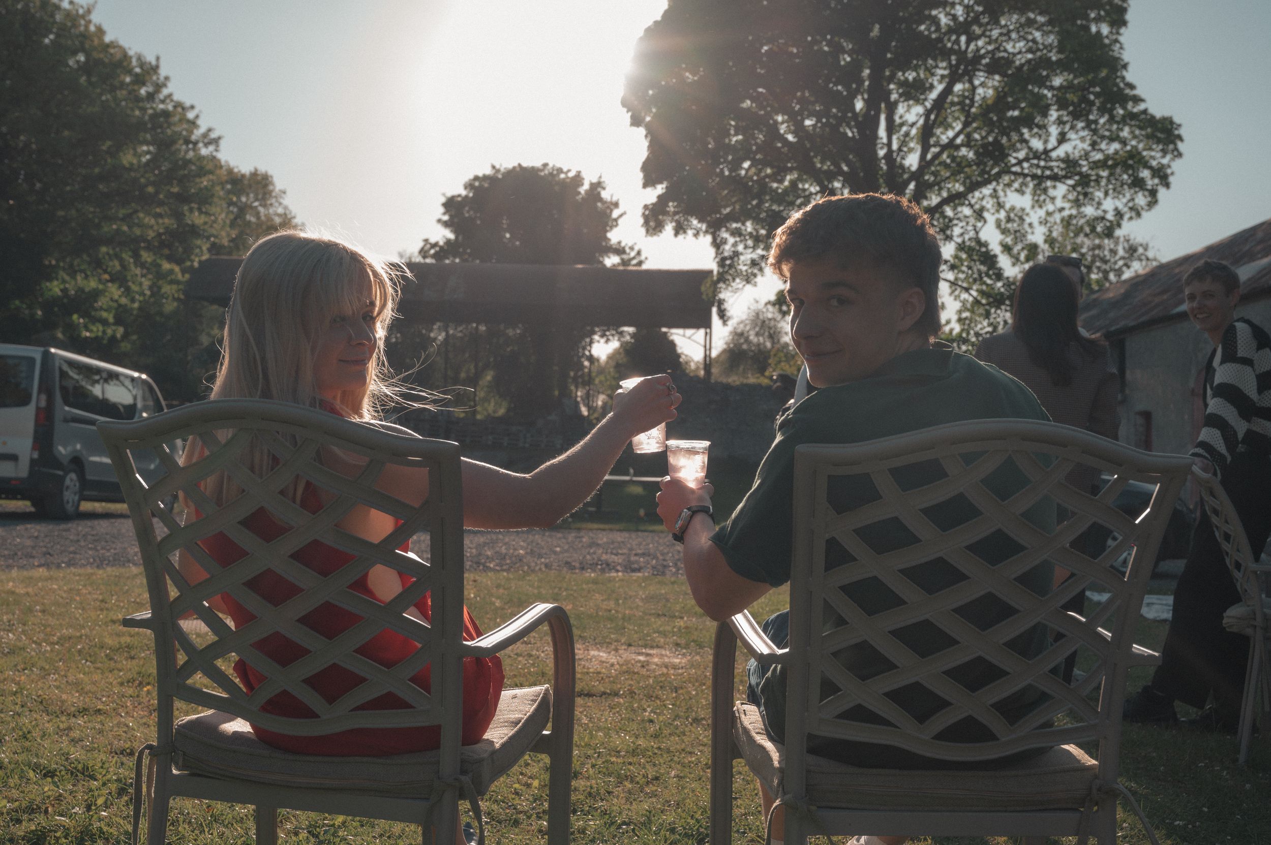 couple clinking glasses, couple photography, family event photography