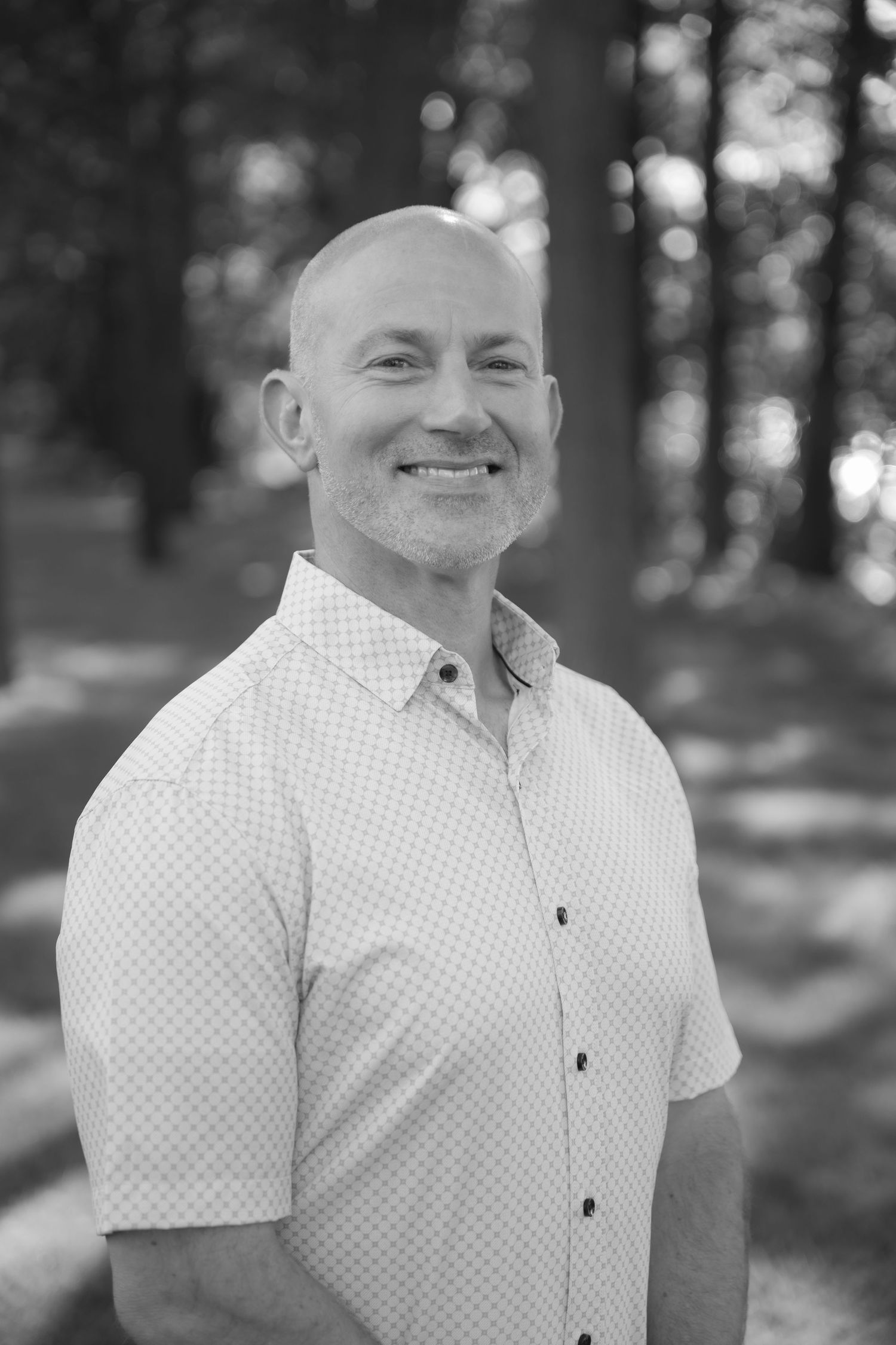 Headshot of dad during summerfamily portrait session on lake wissota in chippewa falls, wi