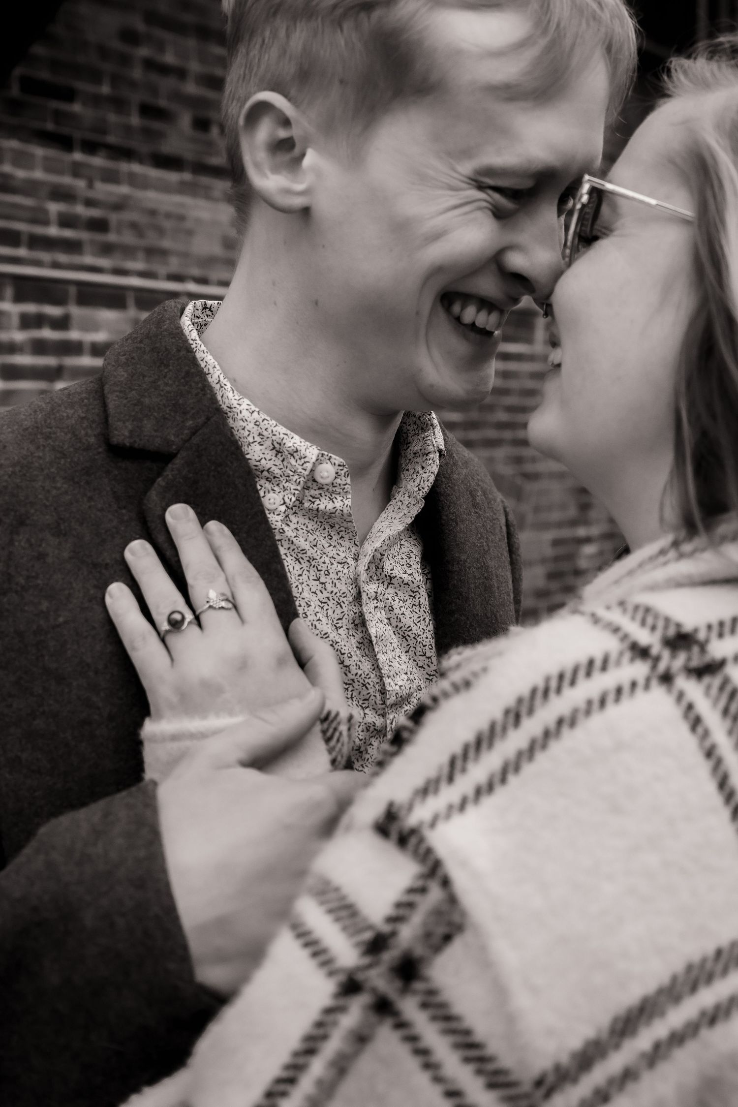 Intimate couple portraits in cream sweaters showing affectionate moments.
