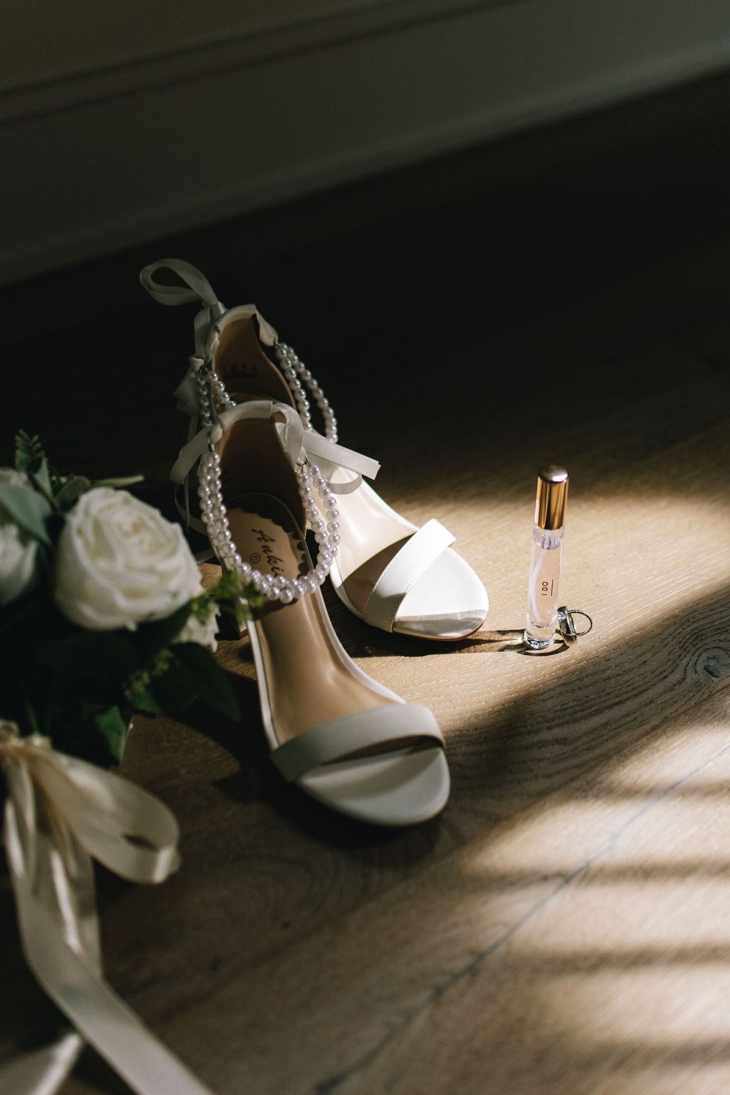 Black and white wedding portraits capturing intimate moments between newlyweds.