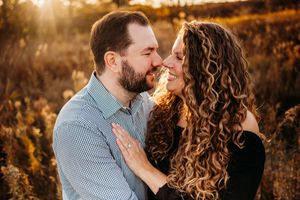 Intimate couple portraits with sunlight streaming through trees at golden hour.