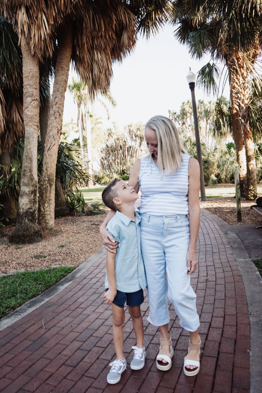 Outdoor Family Session Gisela Kopsick Arboretum in Saint Petersburg, FL; Grandma and grandson looking at each other