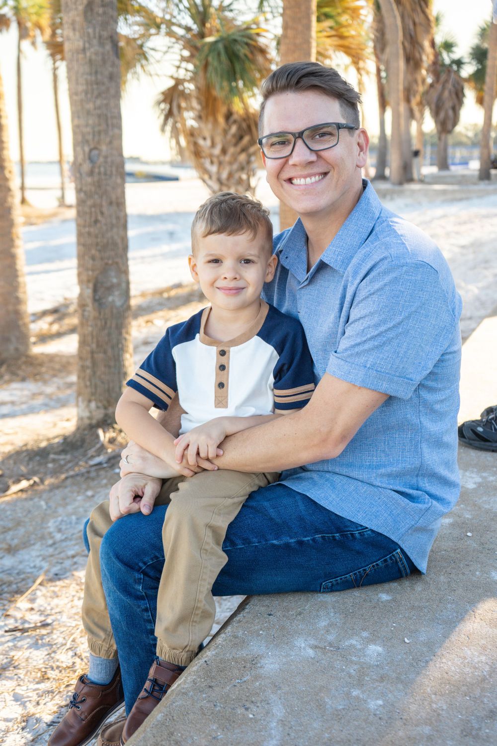 Outdoor Family Session Gisela Kopsick Arboretum in Saint Petersburg, FL; Father and son posing