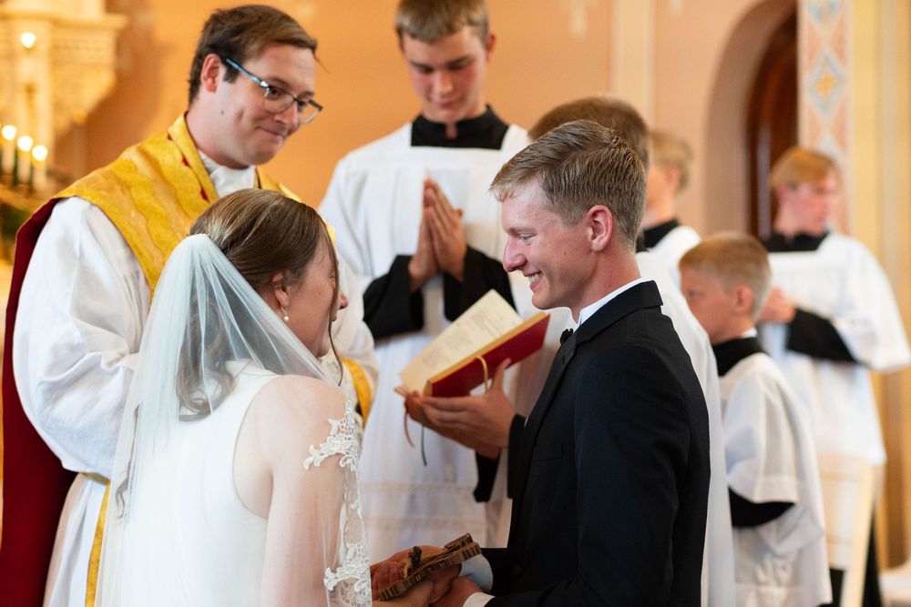 wedding photographer, St. Charles, Illinois, Edwardsville, St. Louis, Catholic Church, Sacrament, candid, mass, bride and groom