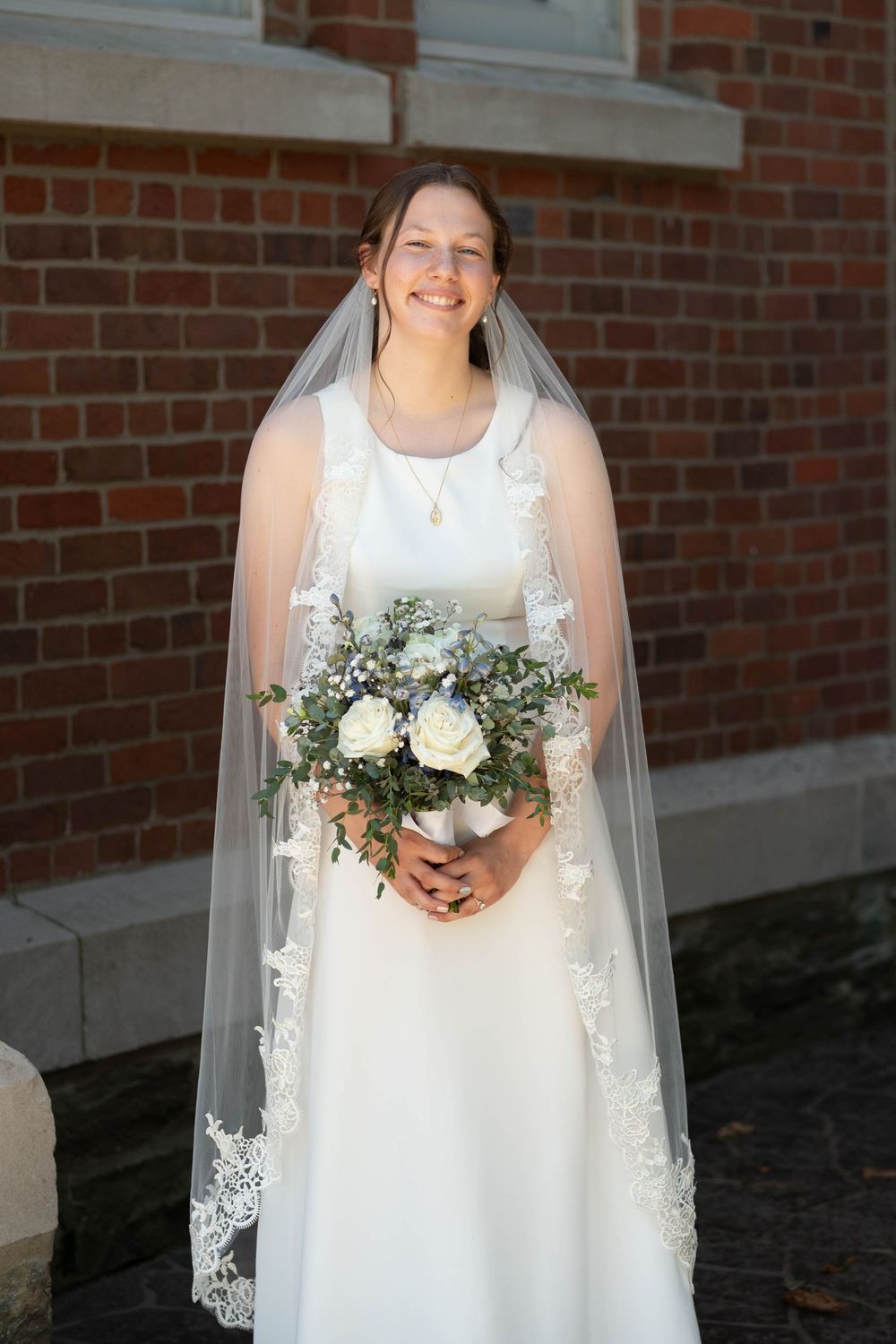 wedding photographer, St. Charles, Illinois, Edwardsville, St. Louis, Catholic Church, Sacrament, candid, mass, portrait of the bride, veil